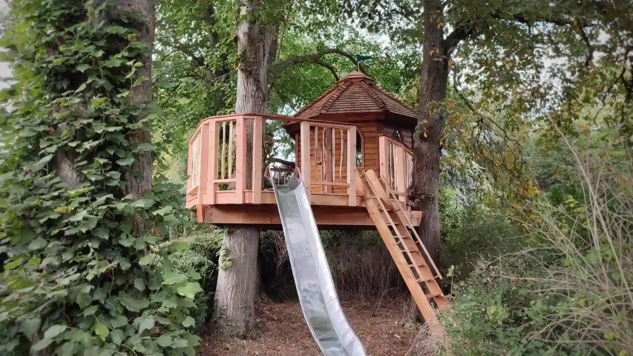 Treehouse Ideas and Designs You Can Build in Your Backyard 1 Play treehouse for kids