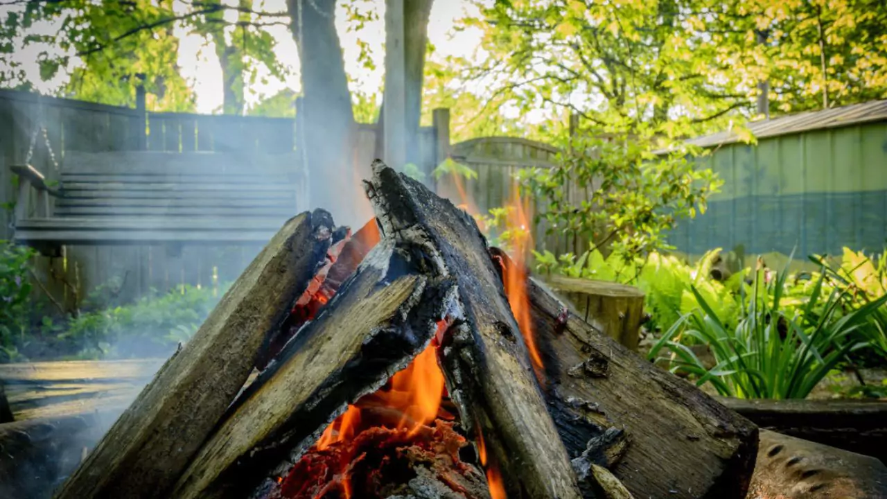 Caution When Using Lava Rock in a Fire Pit 6 Burning wood in a garden