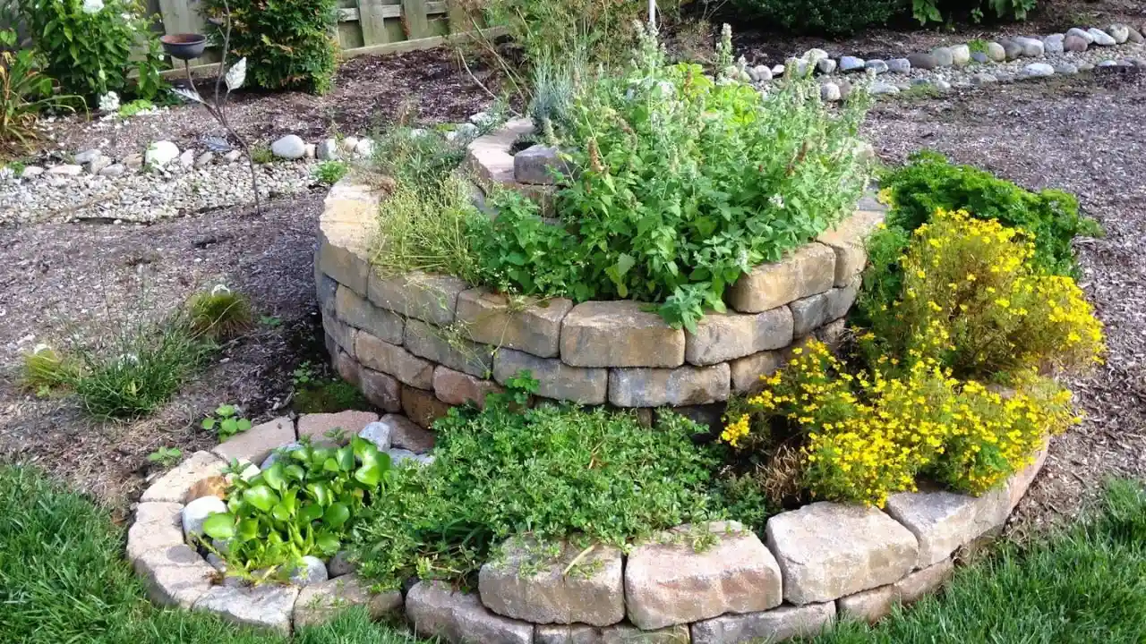 18 Cute Garden Rock Ideas: Achieving a Natural and Relaxing Landscape 9 Spiral herb rock garden